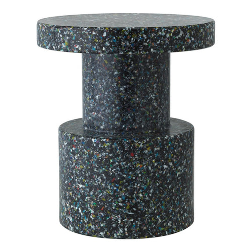 Stylish black terrazzo side table with colorful speckles, featuring a modern cylindrical design. Perfect for any decor.