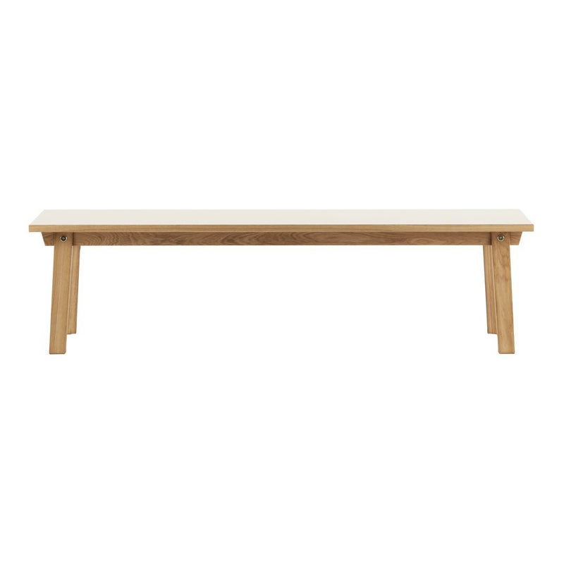 Natural wood bench with a light beige top and sturdy, warm-toned wooden legs. Simple and elegant design.