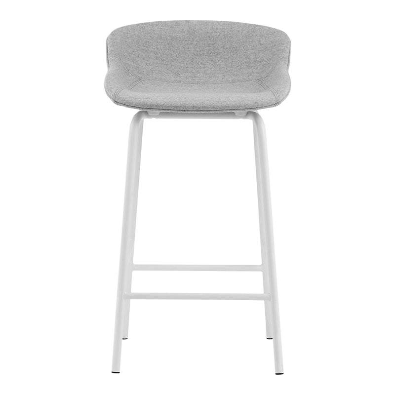 Gray upholstered bar stool with a smooth texture and sleek white metal legs. Ideal for modern decor.
