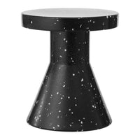 Black and white speckled side table with a modern conical shape and smooth finish. Stylish and contemporary design.