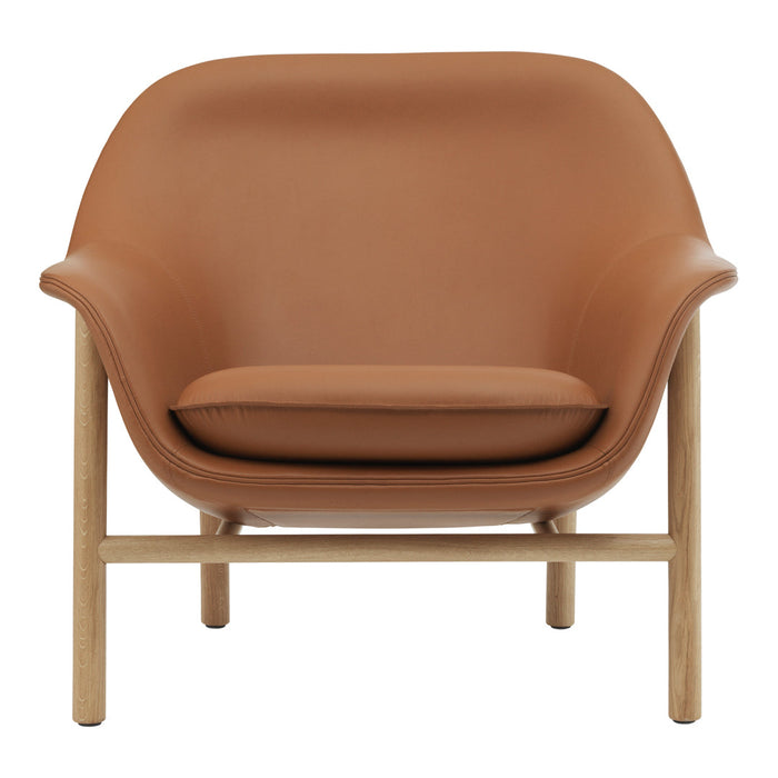 Brown leather armchair with a sleek design and wooden legs, ideal for modern decor.