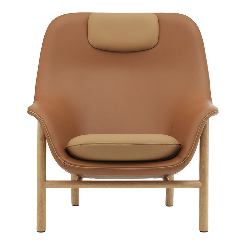 Brown and beige leather armchair with a smooth finish and minimalist design. Perfect for modern interiors.