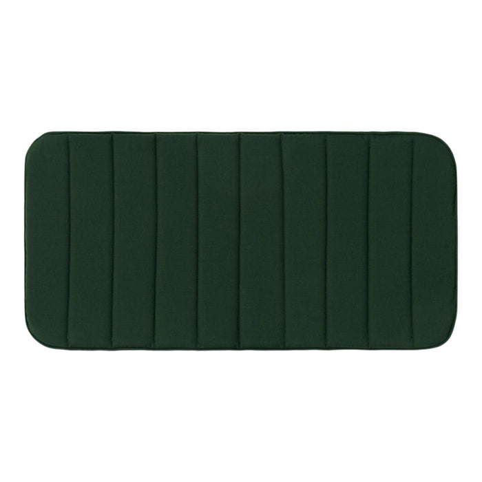 Dark green rectangular mat with textured vertical stripes, perfect for modern decor.