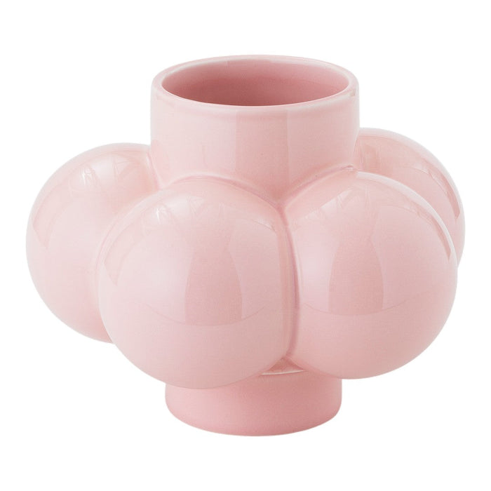 Glossy pastel pink vase featuring a unique, bubbly design with rounded shapes and smooth surfaces.
