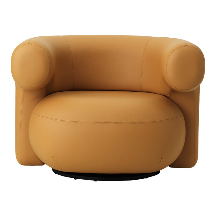 Round, mustard yellow swivel armchair with smooth leather texture and plush, rounded contours. Perfect for modern decor.