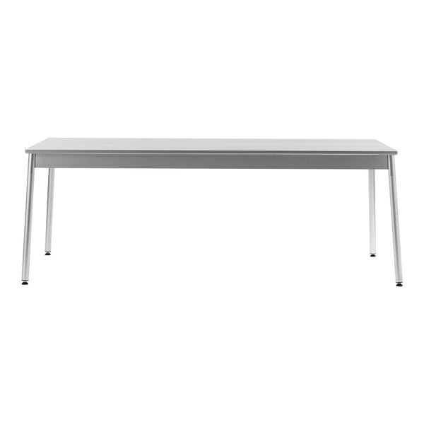 Sleek, modern gray table with a smooth surface and minimalist design, complemented by sturdy silver legs.
