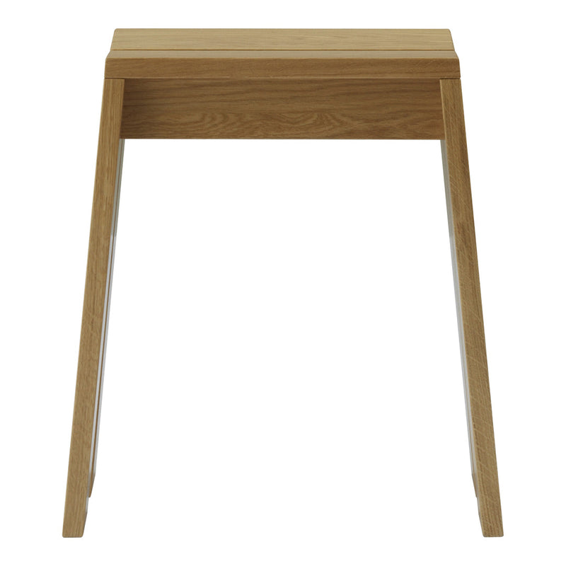 Light oak wood desk with a smooth finish and minimalist design, featuring clean lines and a natural wood grain.