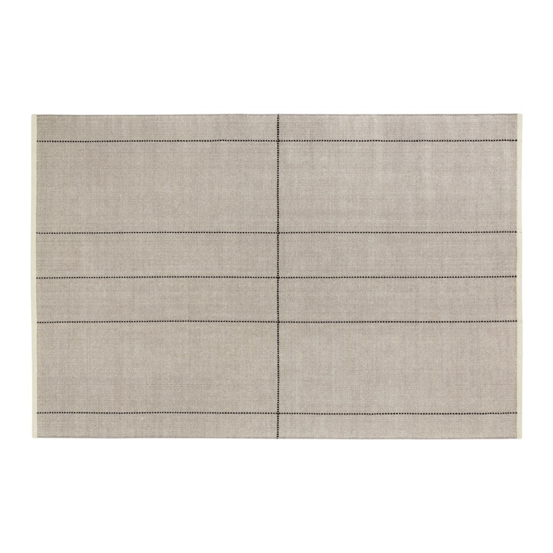 Textured beige rug with subtle black grid pattern, perfect for modern home décor.
