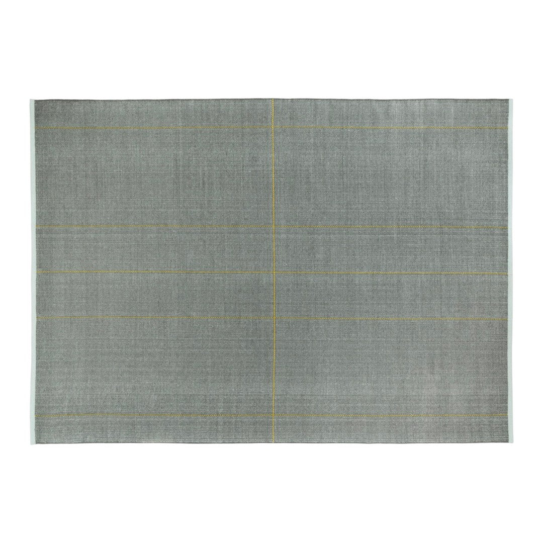Gray area rug with subtle yellow grid pattern and light blue edges. Elegant and modern design for any space.
