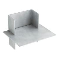 Silver metal bookend with a brushed finish and geometric design.