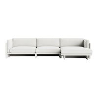 Modern, plush sectional sofa in a soft, neutral white fabric, featuring clean lines and minimalist design.