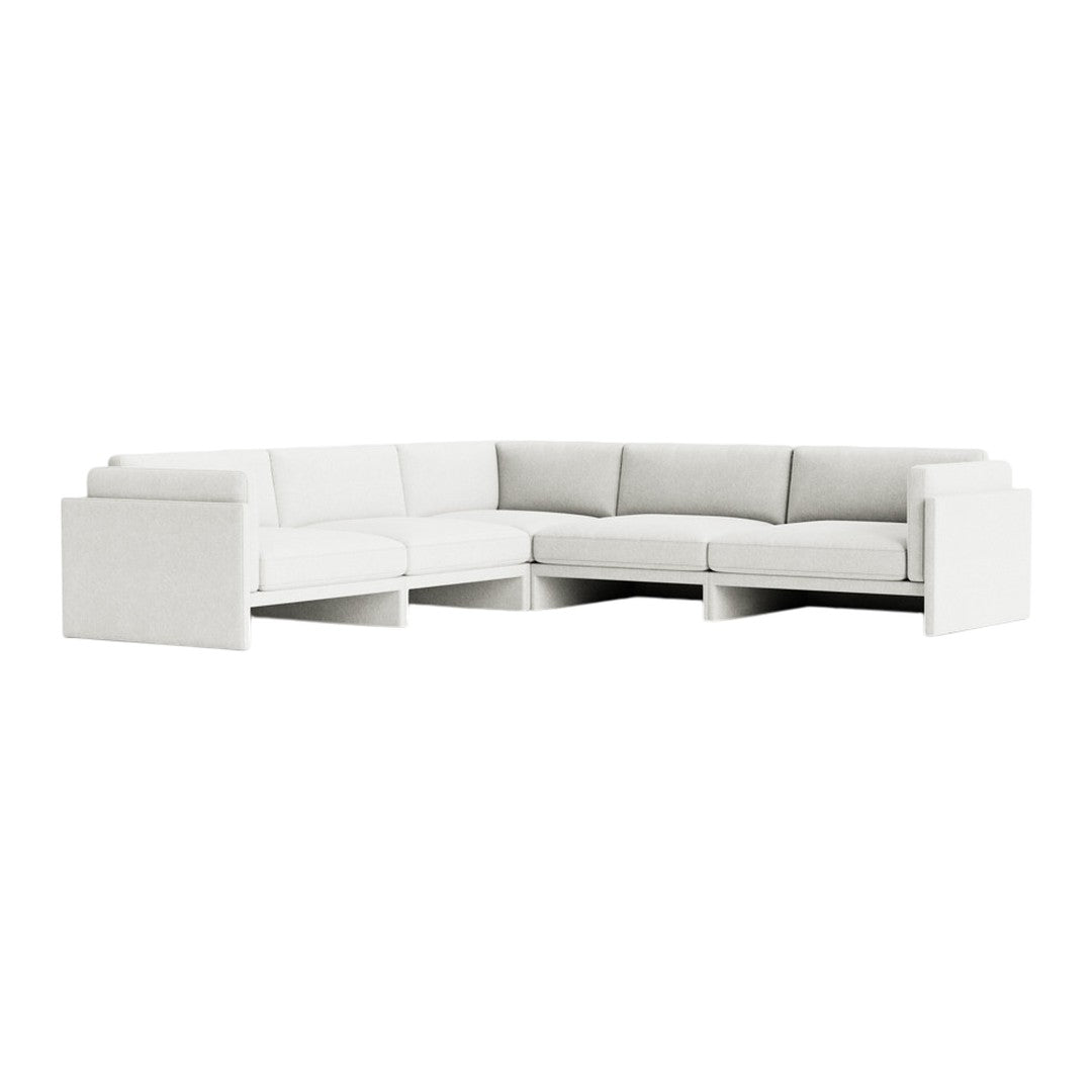 "Modern L-shaped sofa in soft white fabric with clean, minimalistic lines and no visible patterns."