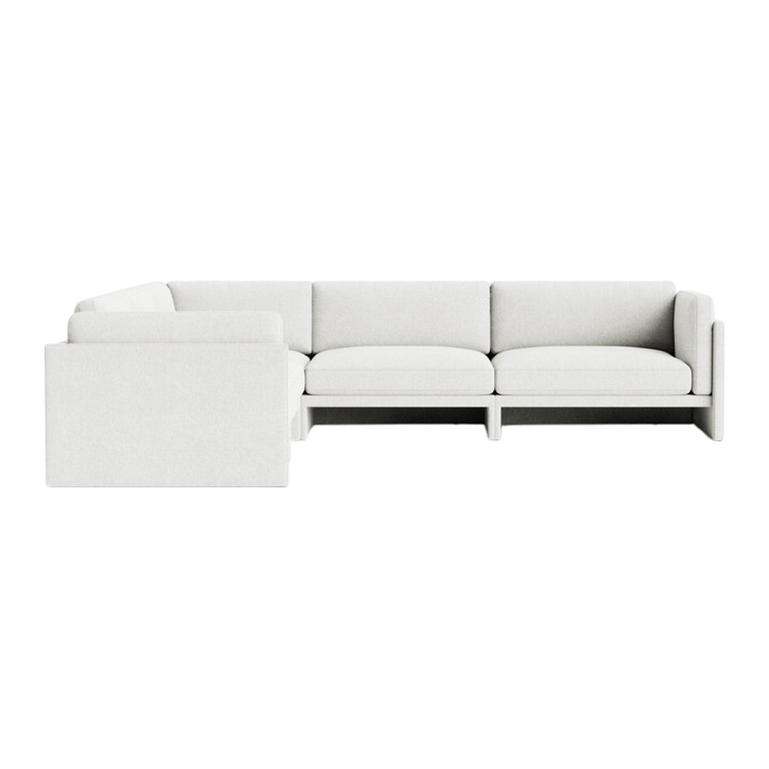 Modern white sectional sofa with a subtle textured pattern and clean lines, perfect for minimalist decor.