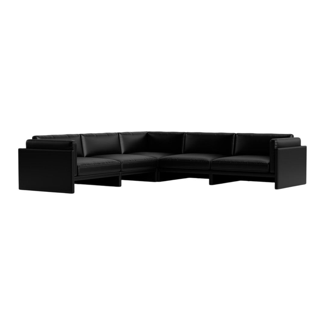 Black L-shaped sofa with smooth, minimalist design and sleek linear patterns, perfect for modern interiors.