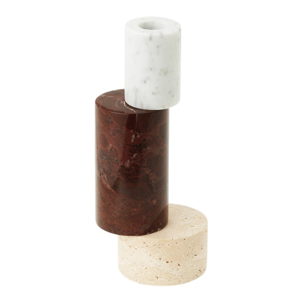 Stacked cylindrical candle holders in white, brown, and beige marble with smooth and speckled textures.