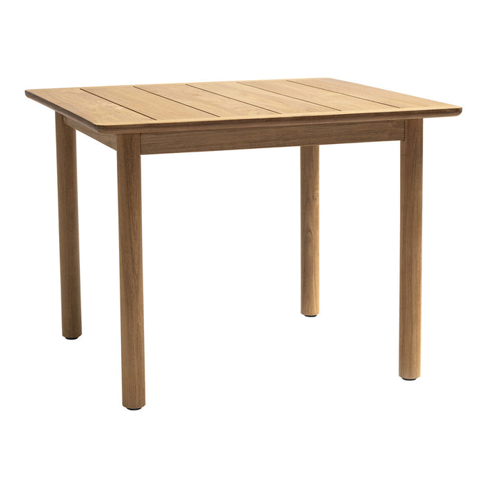 Natural wood dining table with a smooth, light brown finish and horizontal slat pattern. Ideal for modern interiors.