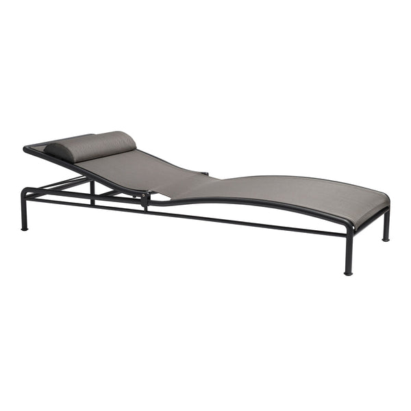 Gray lounge chair with sleek, minimalist design and black metal frame, perfect for outdoor styling.