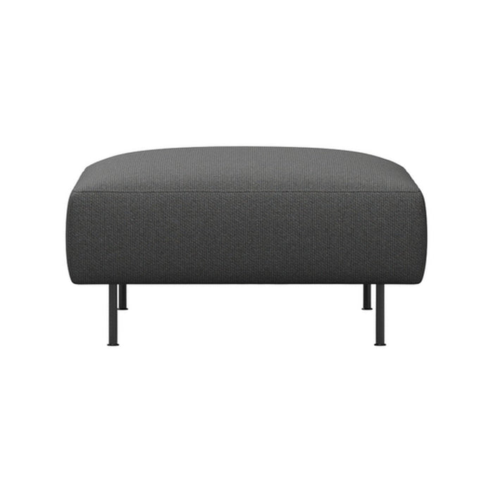 Dark grey ottoman with subtle textured pattern and sleek black legs, perfect for modern decor.