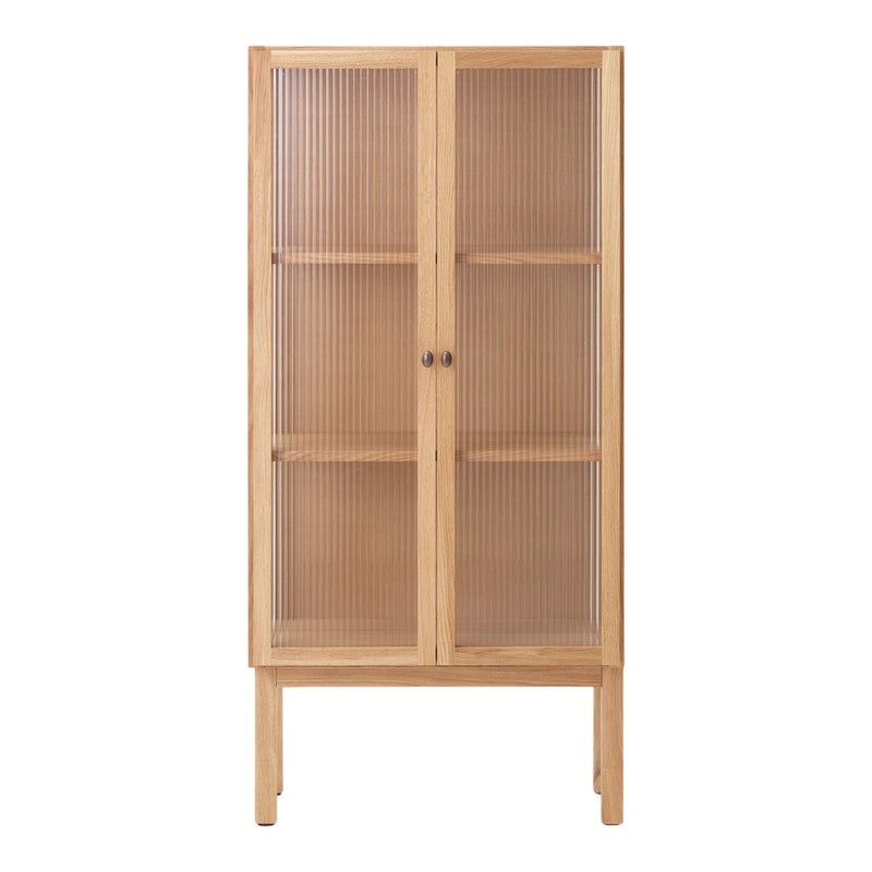 Natural wood cabinet with a light finish and ribbed glass doors, showcasing a minimalist, contemporary design.