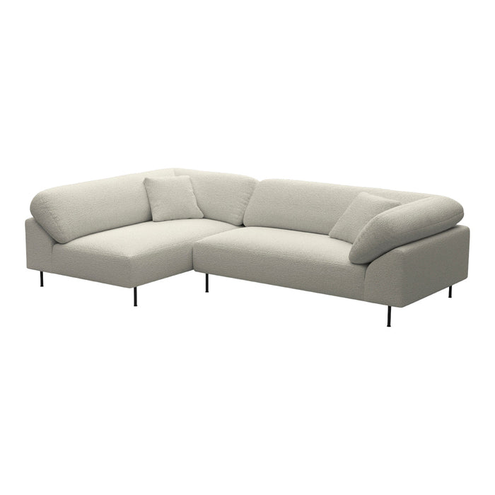 Light gray sectional sofa with a modern design and smooth fabric upholstery, featuring clean lines and no visible patterns.
