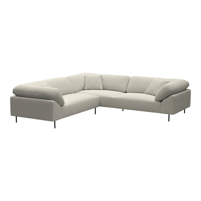 Light gray sectional sofa with a modern design and subtle, smooth fabric texture.