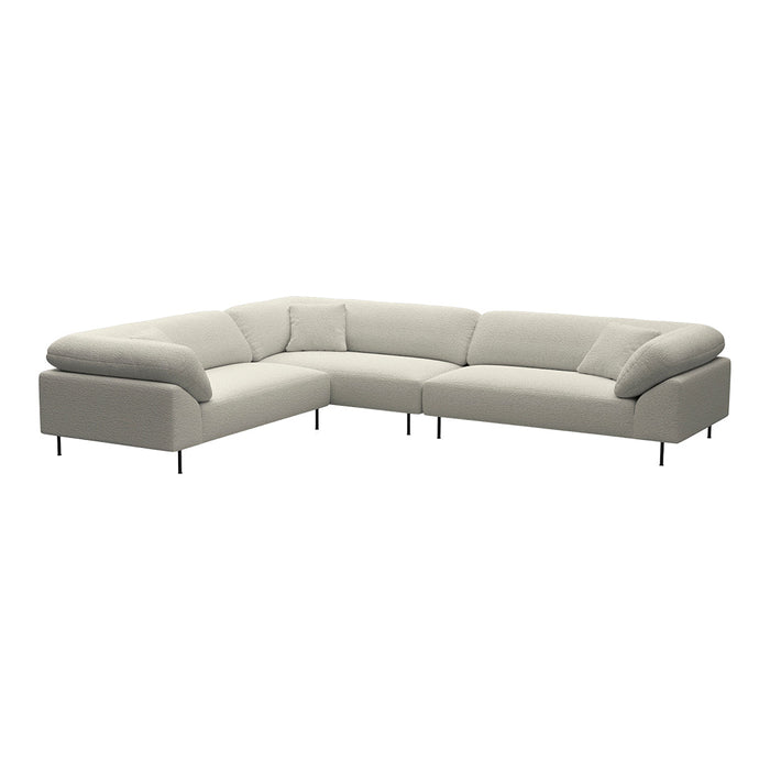 Light gray sectional sofa with smooth, contemporary lines and a minimalist design, perfect for modern living spaces.