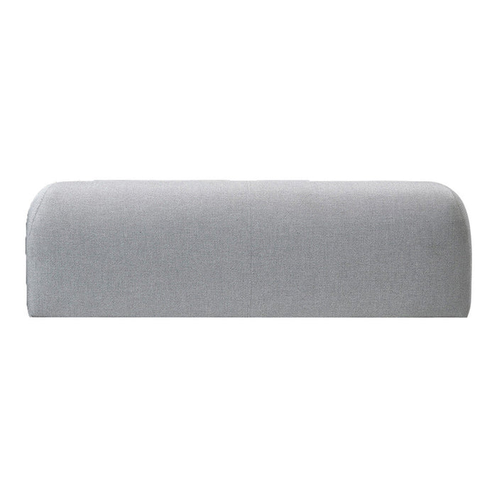 Soft gray upholstered bench with a smooth, modern design, ideal for contemporary interiors.