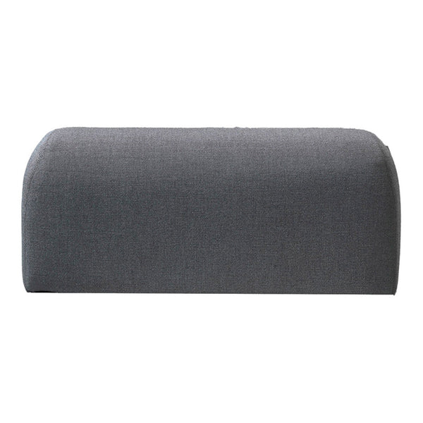 Gray upholstered bench with a smooth, curved design and subtle texture. Ideal for modern decor.