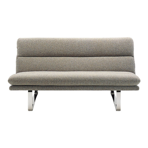 Gray sofa with a smooth, minimalist design and subtle textured fabric on a sleek metallic base.