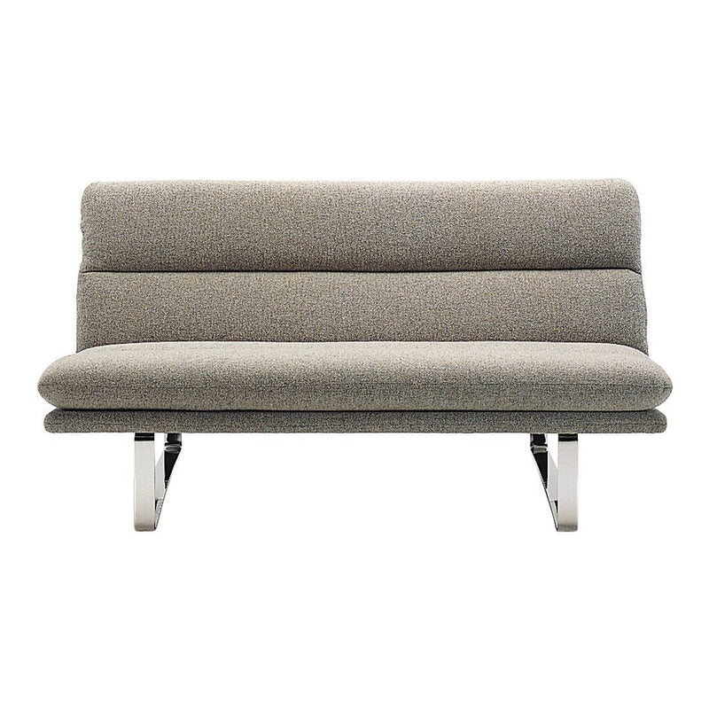 Gray sofa with a smooth, minimalist design and subtle textured fabric on a sleek metallic base.
