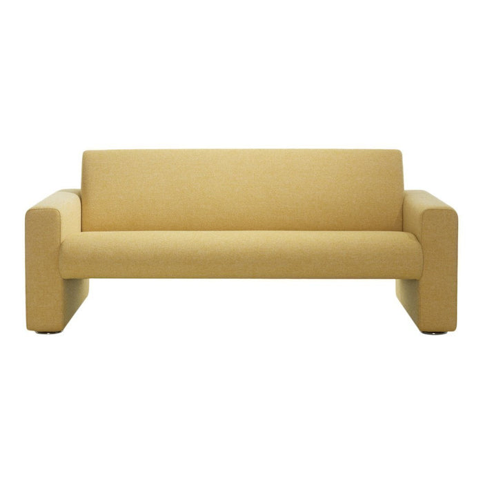 Yellow upholstered sofa with a minimalist design and smooth texture, perfect for modern decor.