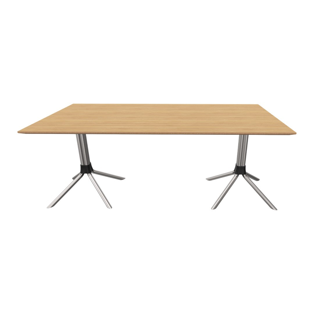 Light wood tabletop with a natural finish and sleek chrome legs, featuring a modern, minimalist design.