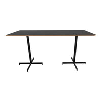Modern black tabletop with natural wood edges and sleek black metal legs, perfect for contemporary spaces.