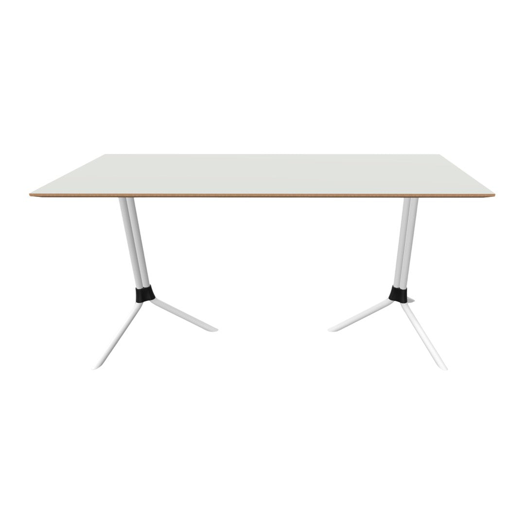 Modern white table with wood grain accents and sleek silver legs, perfect for contemporary spaces.