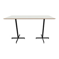 Modern white tabletop with sleek black metal legs, perfect for contemporary spaces and minimalist decor.