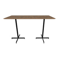 Rectangular table with a wood grain top in warm brown, supported by sleek black metal legs. Modern and stylish design.