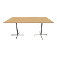 Modern wooden table with a light oak finish and sleek silver metal legs, featuring a minimalist design.