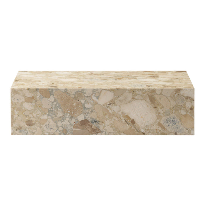 Beige and cream terrazzo block with speckled stone patterns, ideal for modern decor and functional uses.