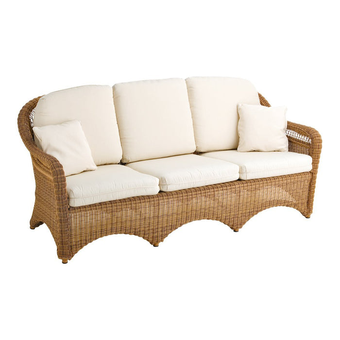 Light beige cushions with a woven wicker base in natural brown tones, featuring a curved, elegant design.