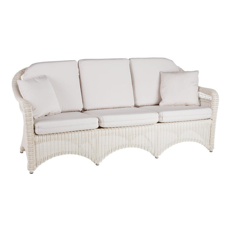 White wicker sofa with soft cream cushions and subtle textured pattern, perfect for indoor or outdoor seating.