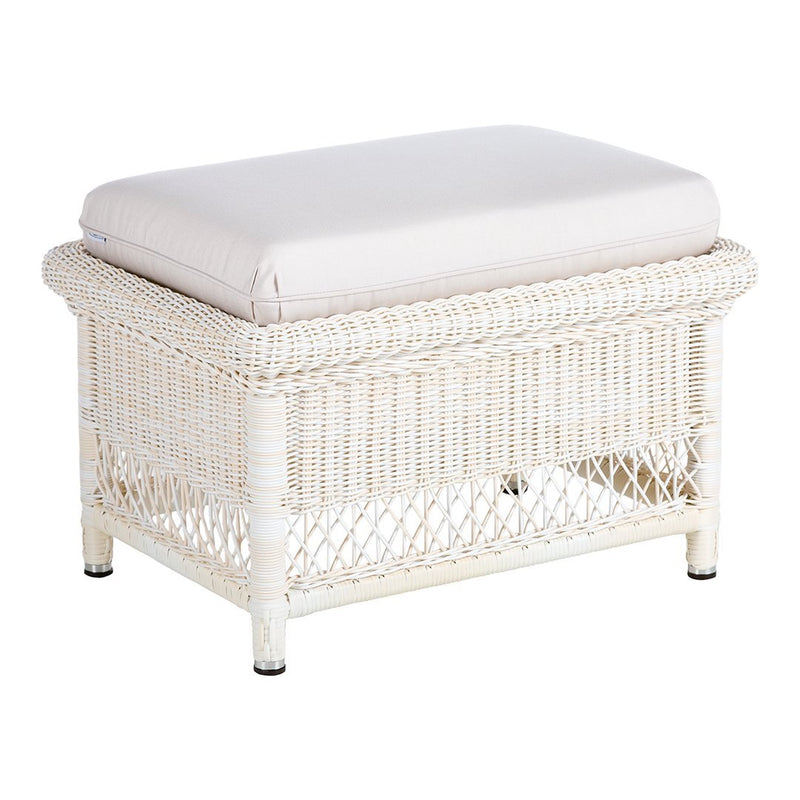 White woven ottoman with a light beige cushion, featuring a textured pattern and elegant design. Perfect for any decor.