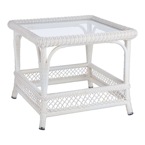 White wicker table with a glass top, featuring intricate woven patterns and a classic design. Perfect for stylish decor.
