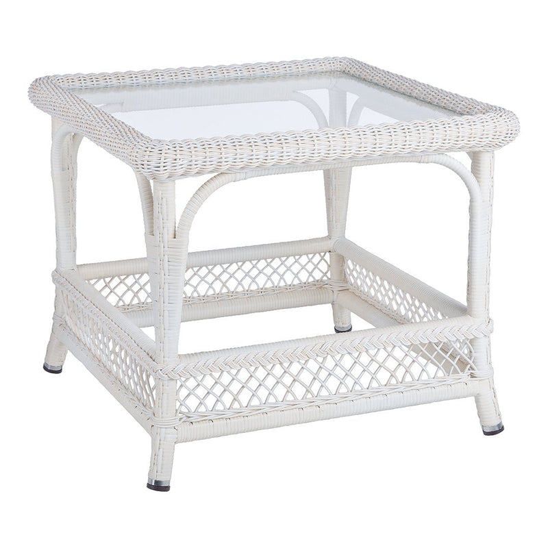 White wicker table with a glass top, featuring intricate woven patterns and a classic design. Perfect for stylish decor.