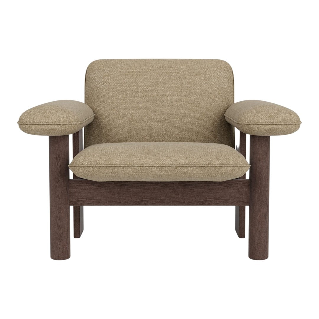 Beige upholstered armchair with brown wooden frame and rounded armrests, featuring a minimalist design.