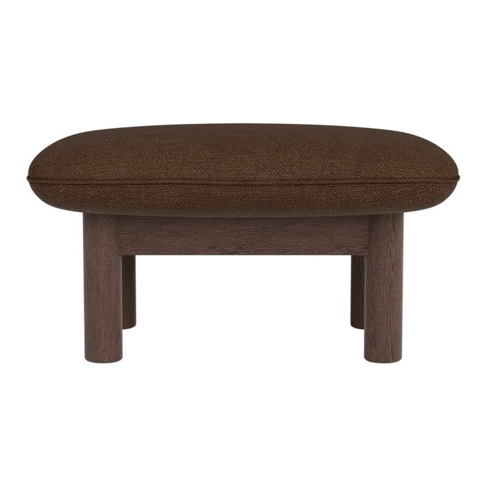 Brown upholstered ottoman with a rounded top and wooden legs, featuring a sleek, modern design.