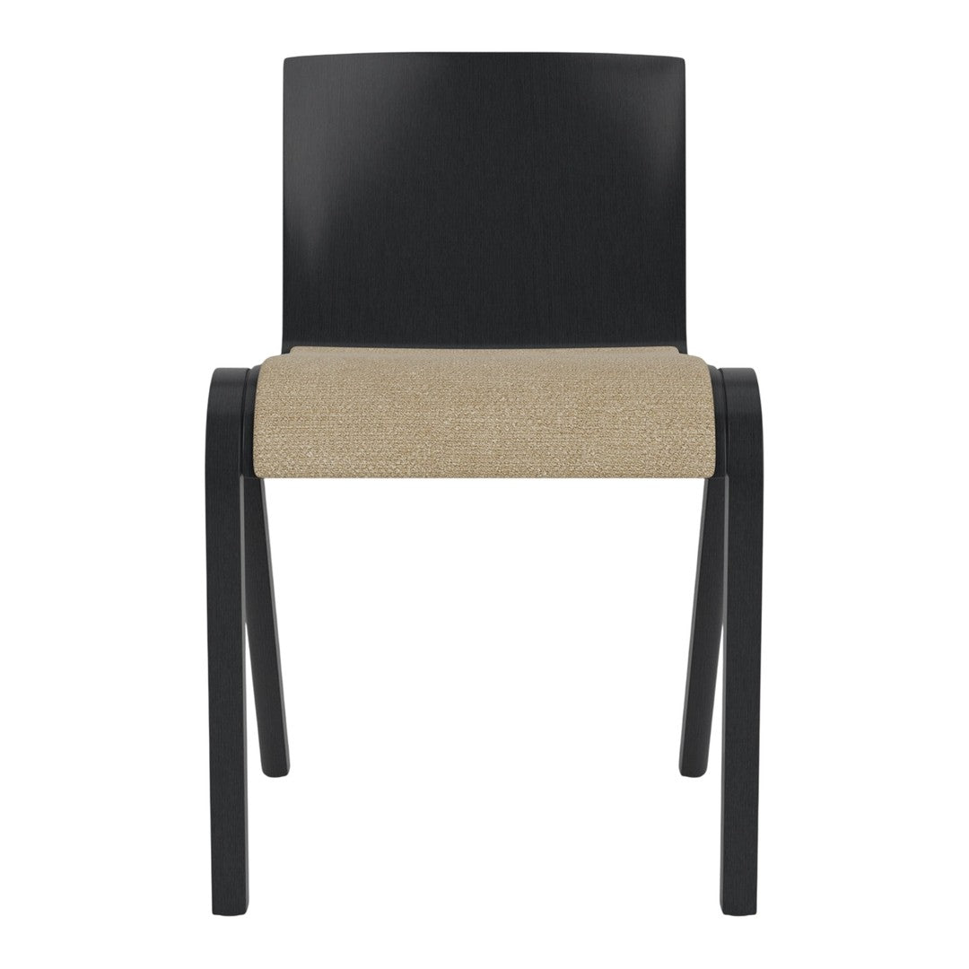 Black wooden chair with a beige woven seat, showcasing a minimalist design and contrasting colors.