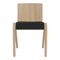 Natural wood chair with a light oak finish and a sleek black cushion seat. Simple, modern design.