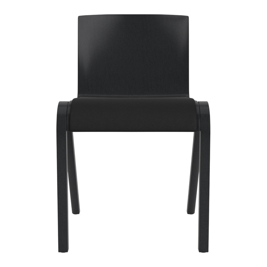 Sleek black chair with a minimalist design and smooth finish, perfect for modern interiors.