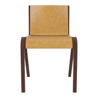 Tan leather chair with a smooth texture and dark brown wooden legs, featuring a minimalist design.
