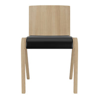 Light wood chair with a sleek black seat, featuring a modern minimalist design and clean lines.